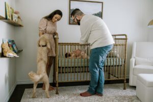 newborn family photo with a dog college station